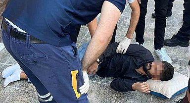 Hakkında 5 yakalama emri bulunan şüpheli polisi görünce 2. kattan atladı